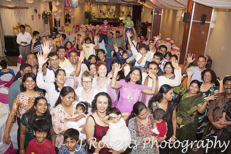 Group photo of all guests celebrating a first birthday party - party photography sydney